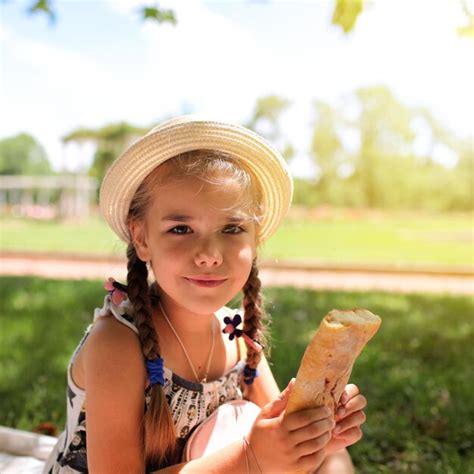 Premium Photo Portrait Of Girl Holding Ice Cream