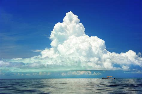 Boat Under Clouds Free Stock Photo - Public Domain Pictures