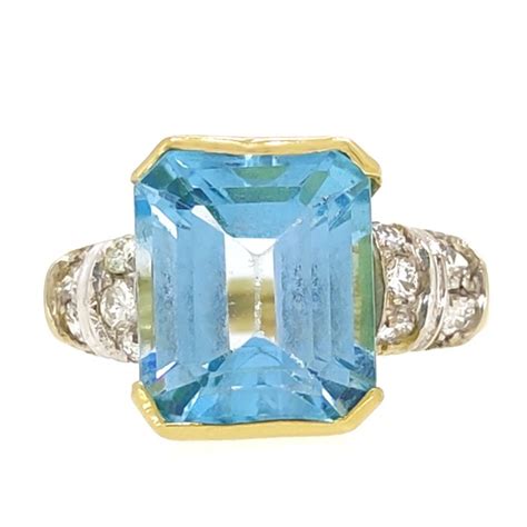 18 Kt White Gold Yellow Gold Ring 4 75 Ct Topaz Catawiki