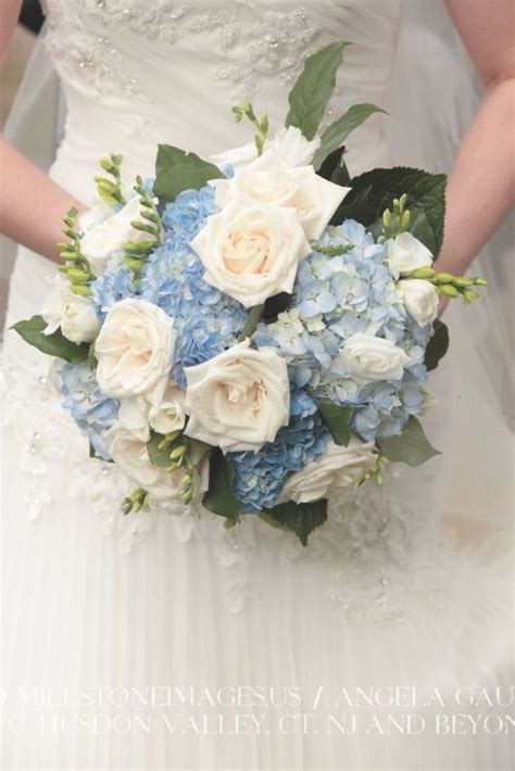 Bridal Bouquet Made Of White Roses And Blue Hydrangeas Real Wedding