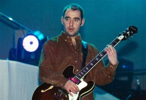 Former Oasis Guitarist Bonehead Completes Cancer Treatment