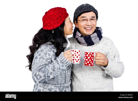 Older Asian Couple Having Hot Drinks Stock Photo Alamy