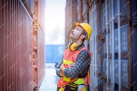 Premium Photo | Portrait team dock workers posing under working and ...