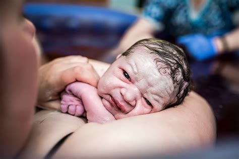 Admire The Photos Capturing The First Moments Of A Newborn Spreading