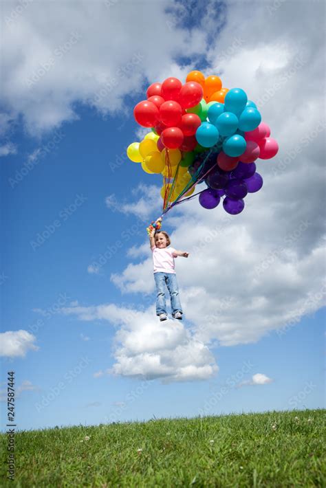 Girl Floating With Balloons