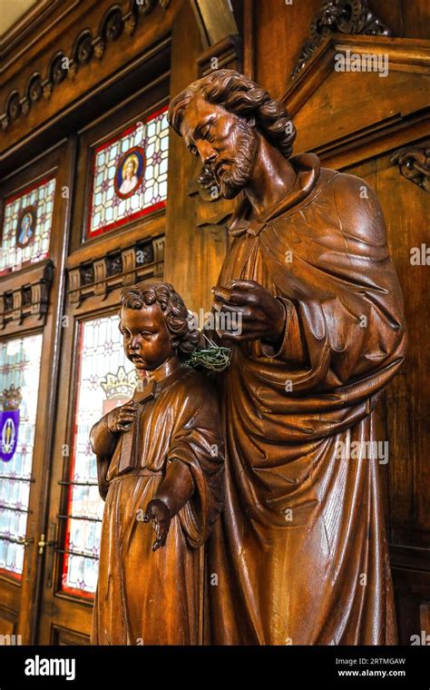 Notre Dame Immaculee catholic church, Brussels, Belgium. Statues of St Joseph and Jesus Stock ...