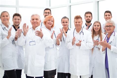 Group of Diverse Smiling Doctors Applauding Together. Stock Image ...