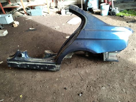 BMW E90 LIFT błotnik lewy tył tylni próg - 12872236039 - oficjalne ...