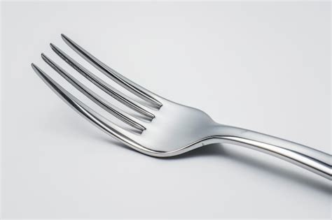 Fork Utensil Shaped Isolated On White Background Premium Ai Generated