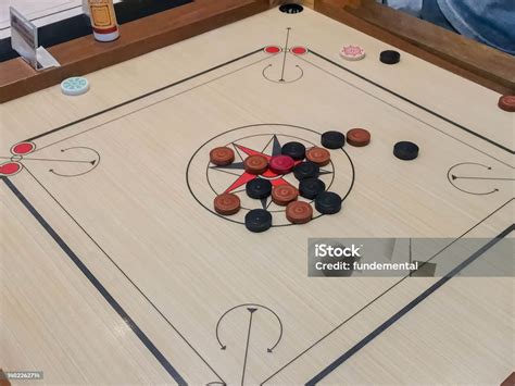 Carrom Stock Photo - Download Image Now - Carrom, Board Game, Coin - iStock