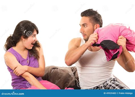 Cute Attractive Couple Having A Pillow Fight Stock Image Image Of Male Brunette 49939483