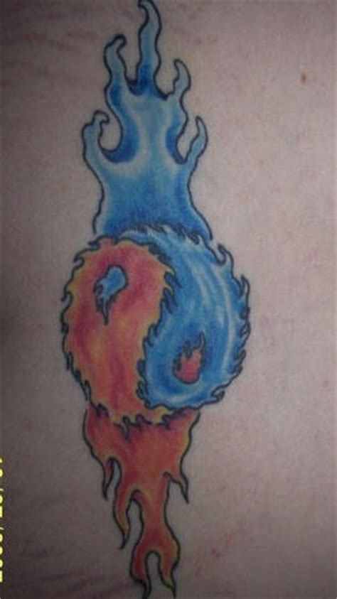 Yin yang tattoo with water and fire - Tattooimages.biz