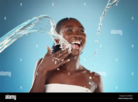 Water Splash Laughing Black Woman And Beauty On Blue Background Of