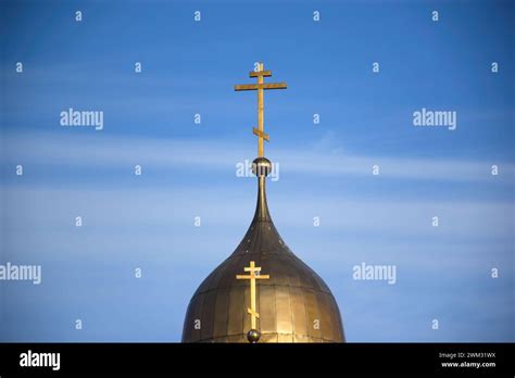 Crucifix Jesus On The Cross In Church With Ray Of Light From Stained