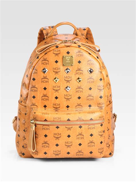 Mcm Stark Sprinkle Stud Medium Coated Canvas Backpack In Brown Lyst