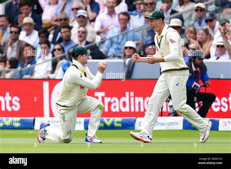 Australias Steven Smith Left Catches The Ball Of Englands Ollie