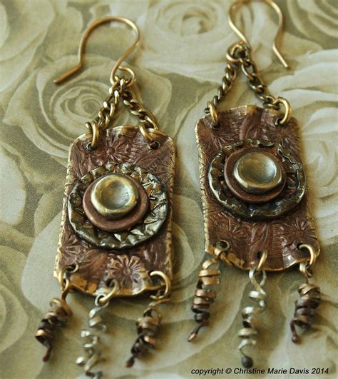 The Earrings Are Made With Bronze Metal And Beadwork Which Is Hanging