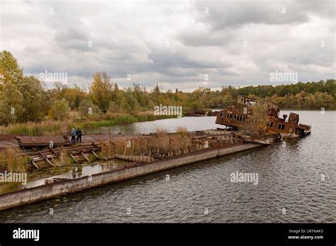 An abandoned and sunken ship at the Chernobyl Port in Chernobyl Stock ...