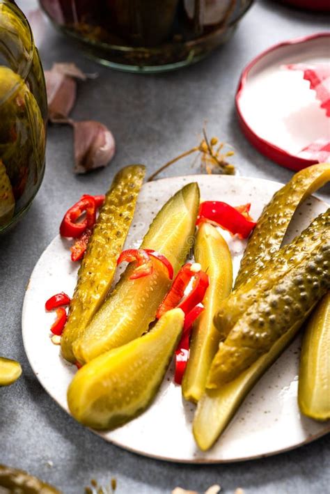 Pickled Cucumber Gherkins With Hot Chili Pepper In Jar Stock Image