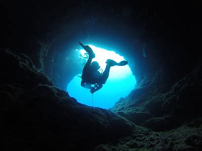 Royalty Free Photo Man Wearing Black And Red Diving Suit Underwater