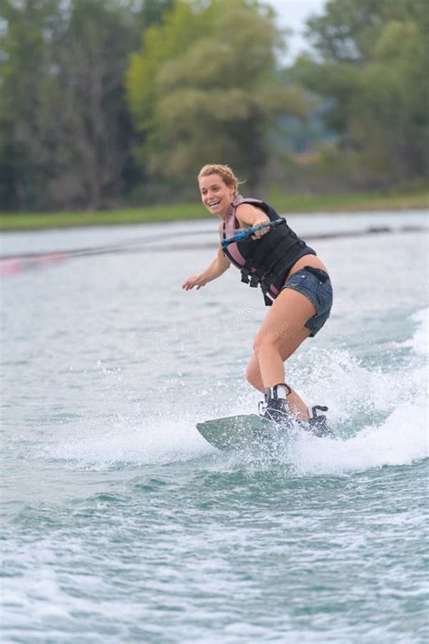 Young Pretty Woman Riding Wakeboard On Wave Stock Image Image Of