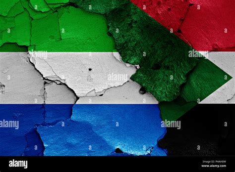 Flags Of Sierra Leone And Sudan Painted On Cracked Wall Stock Photo Alamy