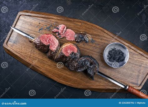 Modern Style Barbecue Dry Aged Wagyu Brazilian Picanha On A Skewer On A