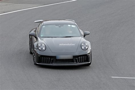 2025 Porsche 911 Spied With Minimal Camouflage Will Debut Summer 2024