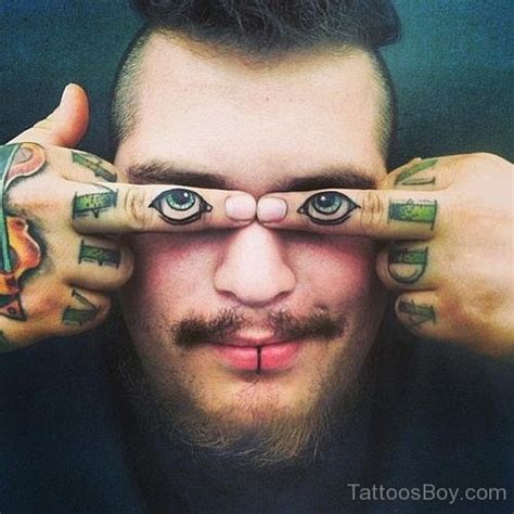 Fantastic Eyes Tattoo On Finger Tattoo Designs Tattoo Pictures