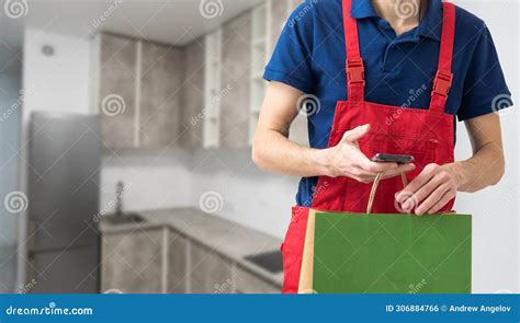 Box With Fast Food Being Carried By Delivery Man In Uniform For One Of