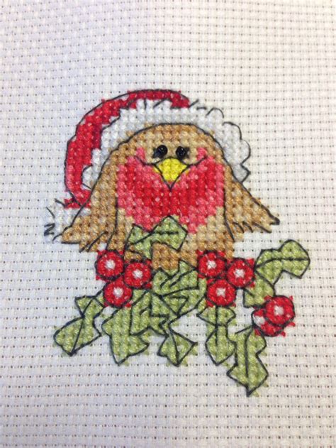 Cute little robin in Santa hat with holly X-stitch | Cross stitch ...
