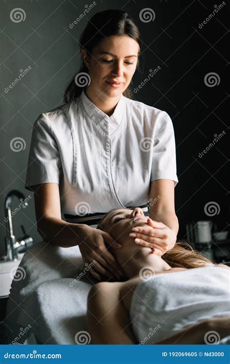 Masseur Doing Massage On Woman Body In The Spa Salon Stock Image