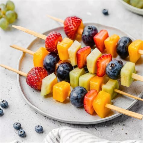 Premium Photo Close Up Rainbow Fruit Skewers