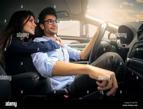 Woman And Man Hugging In Car Stock Photo Alamy