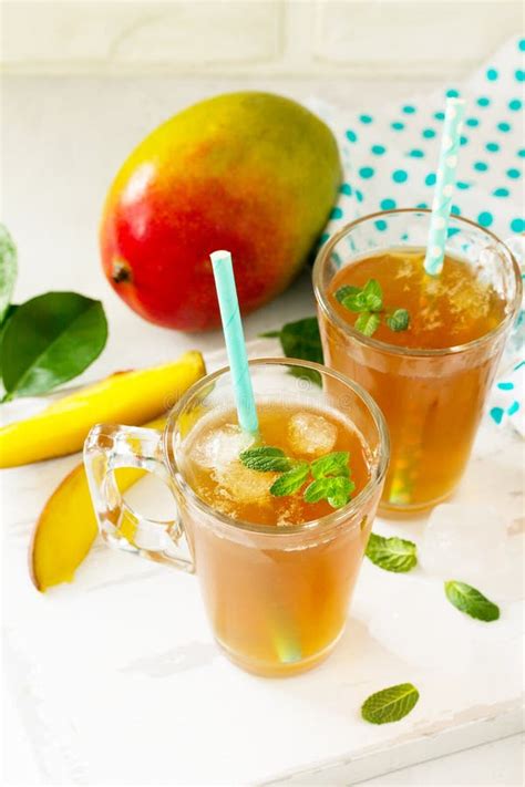 Fruit Tea Cups Iced Tea Mango With Mint Stock Photo Image Of Food