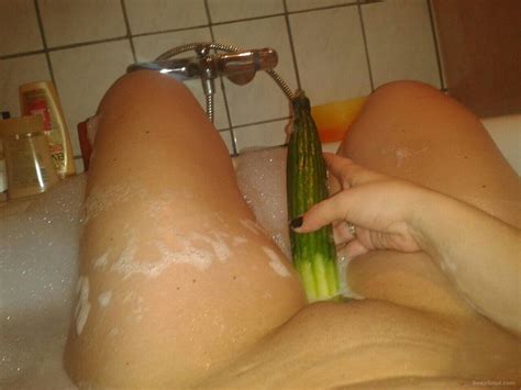 Milf Is Playing With Cucumber In The Bathtub