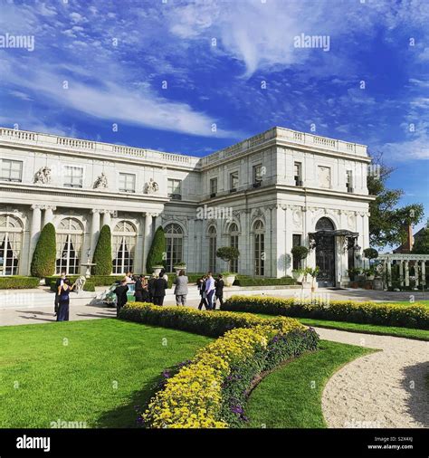 People Gathering For A Wedding At Rosecliff A Mansion Designed By