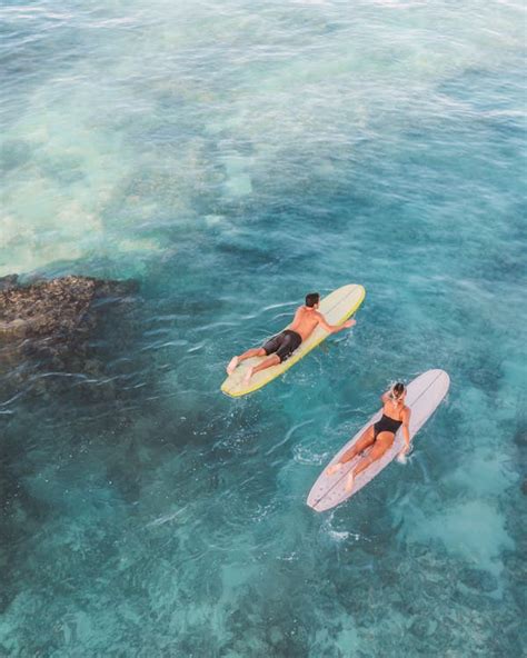 Two People Surfing on the Beach · Free Stock Photo