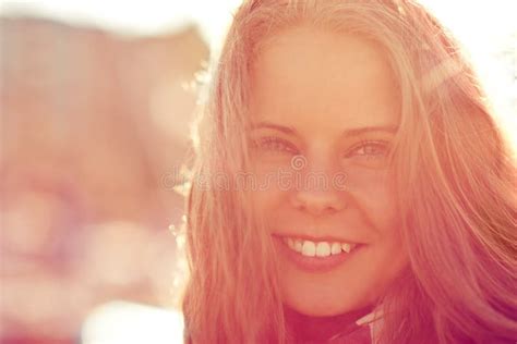 Shes Beautiful Portrait Of A Beautiful Woman Standing Outside Stock