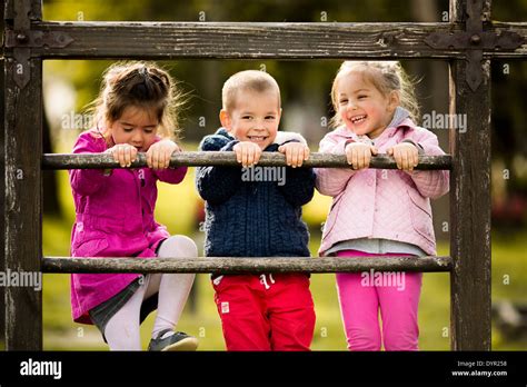 Kids at playground Stock Photo - Alamy