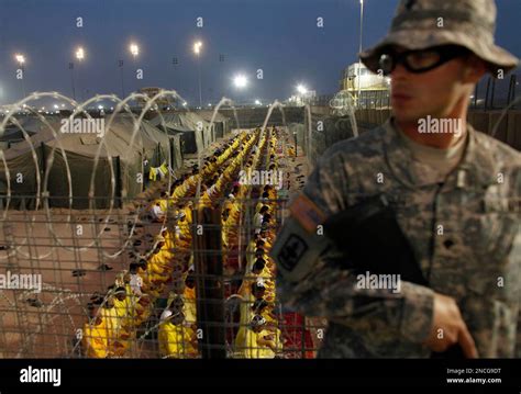 File In This March 16 2009 File Photo A Us Soldier Stands Guard