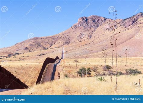 The US-Mexico Border Wall in Arizona Desert Stock Photo - Image of ...