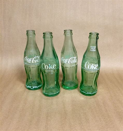 Vintage Coke Bottles Set of 4 Coke Glass Bottles by SalvageAndHawk