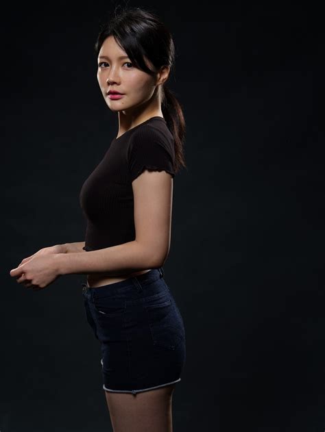 4K Asian Brunette Girl Shorts Hands Glance Black Background HD Phone Wallpaper Rare Gallery