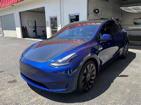 2023 Tesla Model Y Blue Metallic — Detailership™