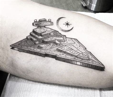 Photo - Star Destroyer tattoo by Arthur Coury | Photo 27741 | Star wars tattoo, Star tattoos ...