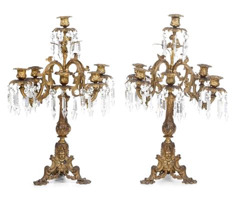 Coppia Di Candelabri In Metallo Dorato E Cristalli XiX Secolo Asta