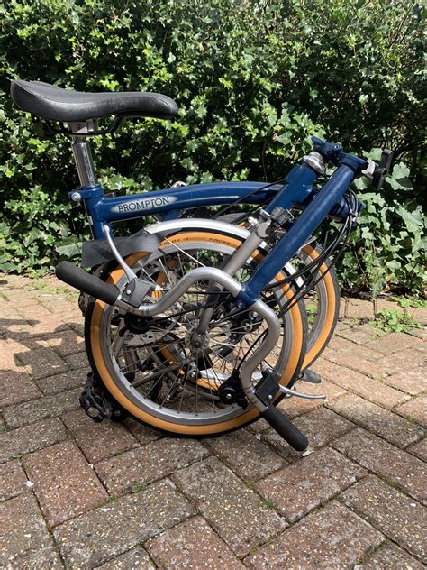 Brompton M6R X Superlight Titanium Forks Tempest Blue Tan Wall Tyres