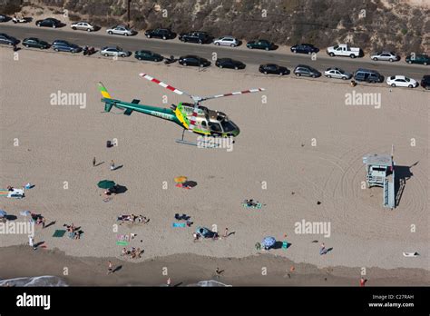 AIR-TO-AIR VIEW. Los Angeles Sheriff Department's helicopter (as350 Eurocopter) patrolling above ...