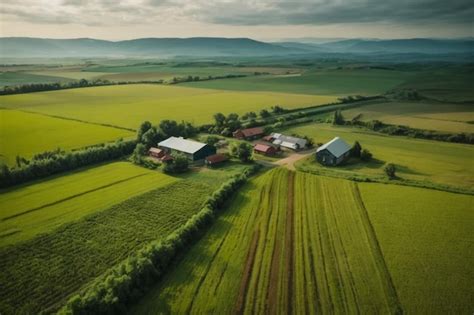 Premium Ai Image Stunning Aerial View Of Green Fields And Farmlands